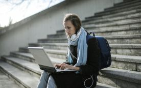 A student completes the FAFSA on a laptop. Beginning April 