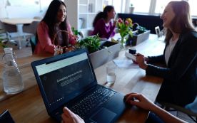 Three women on table