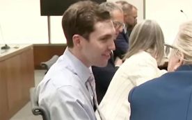 Tyler Robinson seen smiling court during hearing