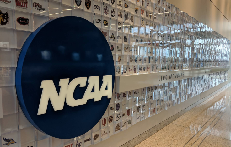 NCAA basketball game in progress as federal prosecutors reveal 26 